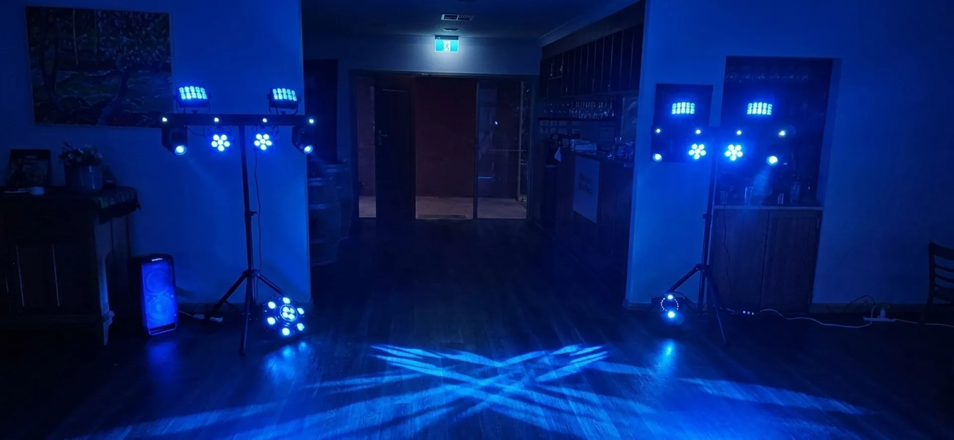 Wash and moving-head lights set up in a function room